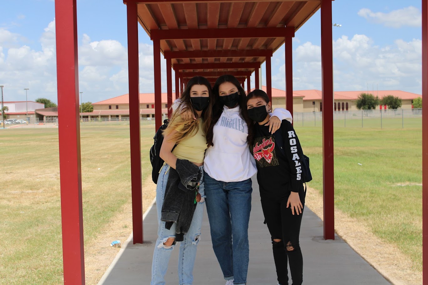 Students in front of cover walkway