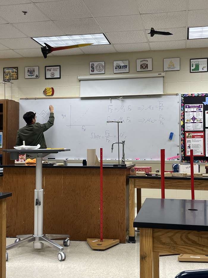 Man writing on whiteboard