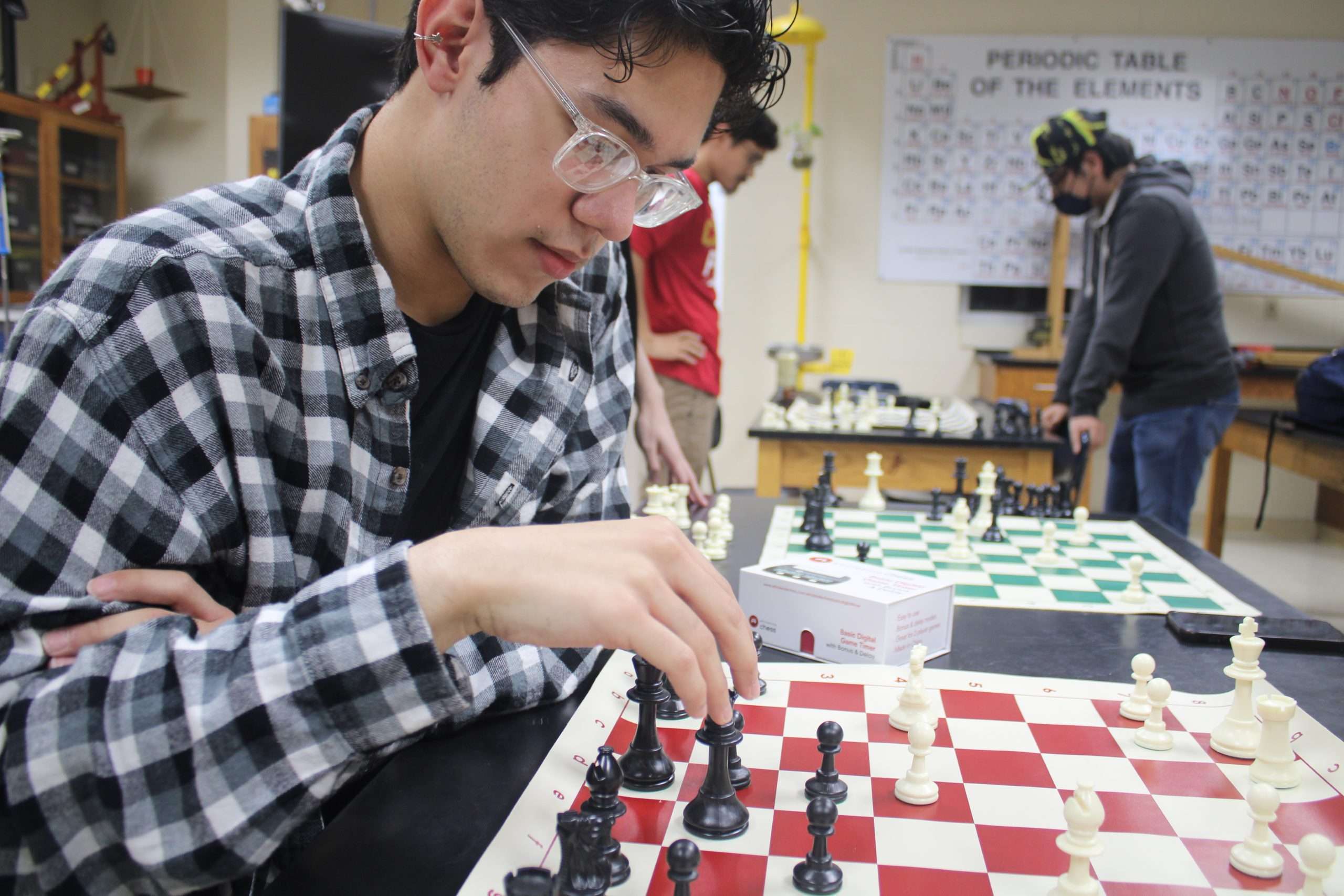 Student playing chess.